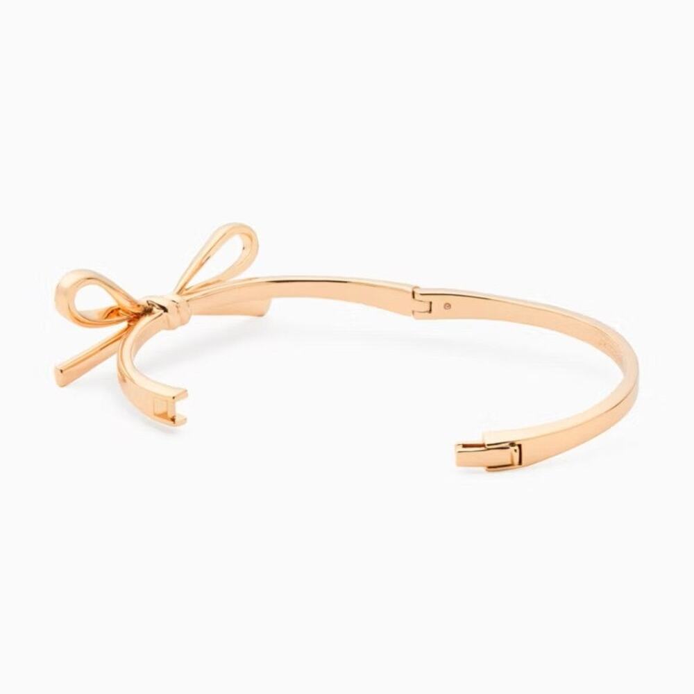 Kate Spade Skinny Mini Bow Bangle Rose Gold Tone Bracelet - Picture 2 of 5